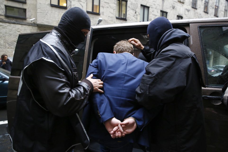 Photo: The Internal Security Agency (ABW) officers escort a man arrested on suspicion of spying in front of the district court in Warsaw October 17, 2014. Two men arrested by Polish authorities on suspicion of spying were working for Russian intelligence, a member of the Polish parliament's intelligence committee said on Friday. Credit: REUTERS/Kacper Pempel