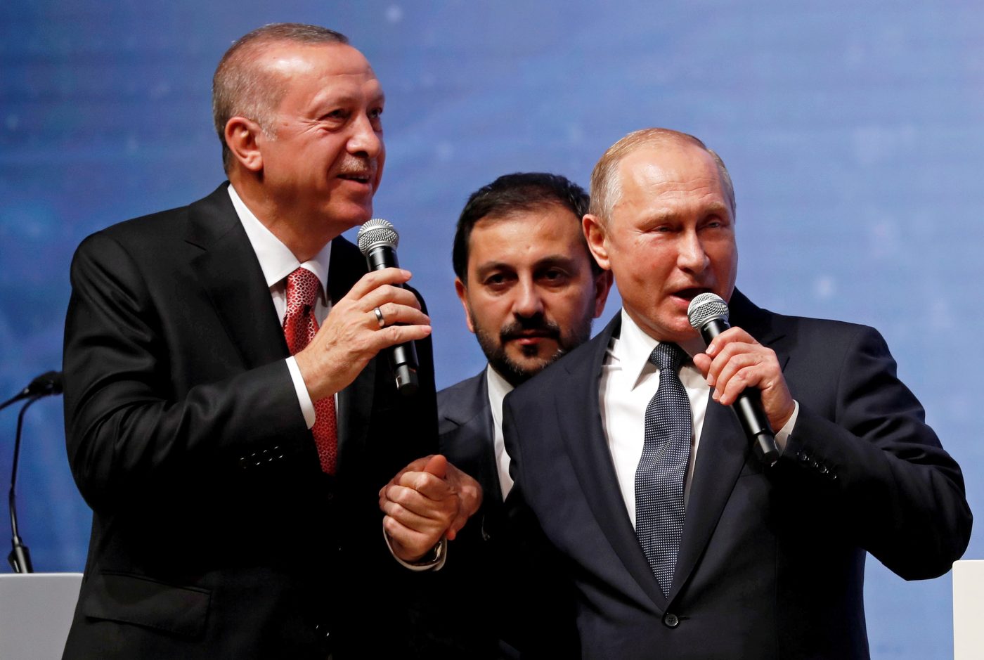 Photo: Turkish President Tayyip Erdogan and his Russian counterpart Vladimir Putin talk during a ceremony to mark the completion of the sea part of the TurkStream gas pipeline, in Istanbul, Turkey November 19, 2018. Credit: REUTERS/Murad Sezer