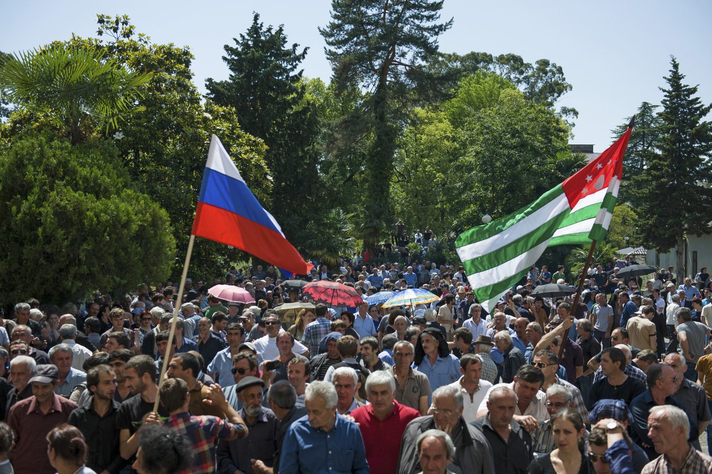 Photo: Opposition protesters gather outside the presidential headquarters in Sukhumi, the capital of Georgia's breakaway region of Abkhazia May 28, 2014. Russia expressed concern on Wednesday over unrest in Abkhazia, where demonstrators have seized control of the presidential administration headquarters in what the leader of the Moscow-backed breakaway province of Georgia called an attempted coup. Credit: REUTERS/Nina Zotina (GEORGIA - Tags: POLITICS CIVIL UNREST)