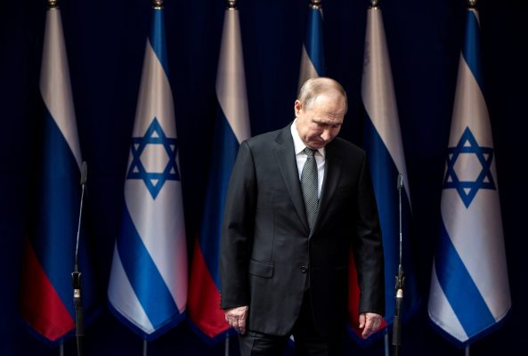 Photo: Russian President Vladimir Putin looks on as he is welcomed by Israeli Prime Minister Benjamin Netanyahu and his wife Sara (not pictured) ahead of the World Holocaust Forum at the Yad Vashem memorial centre in Jerusalem, January 23, 2020. Credit: Heidi Levine/Pool via REUTERS