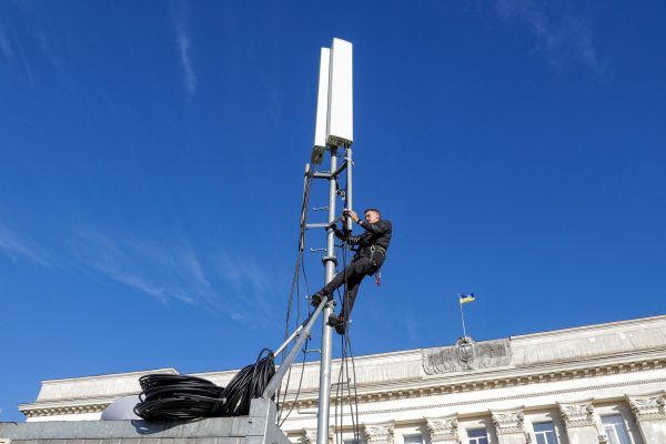 Photo: KHERSON, UKRAINE - NOVEMBER 14, 2022 - A worker sets up a base station outside the Kherson Regional State Administration building in Kherson which was liberated from Russian invaders Friday, November 11, southern Ukraine. Credit: Photo by Nina Lyashonok/Ukrinform/ABACAPRESS.COMNo Use Russia.
