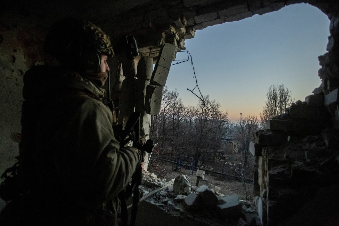 Photo: A Ukrainian serviceman looks on, amid Russia's attack on Ukraine, in Bakhmut, Donetsk region, Ukraine January 27, 2023. Credit: REUTERS/Yan Dobronosov