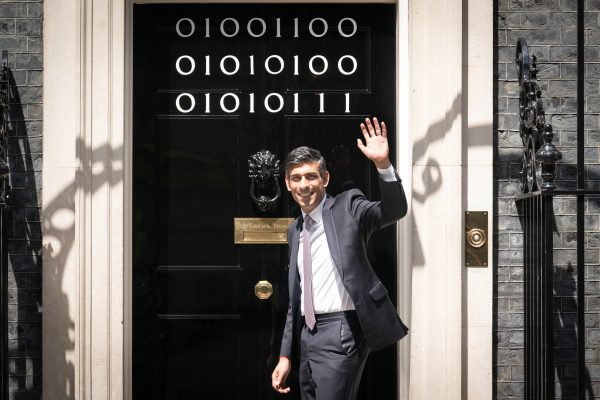 Photo: PA via Reuters Prime Minister Rishi Sunak stands at the door of 10 Downing Street, London, as numbers stuck to the door spell out 'London Tech Week' in binary code, ahead of a garden reception for London Tech Week. Binary code is a form of coding language that uses only two symbols, '0' and '1', to convey and store information. Credit: Picture date: Wednesday June 14, 2023.