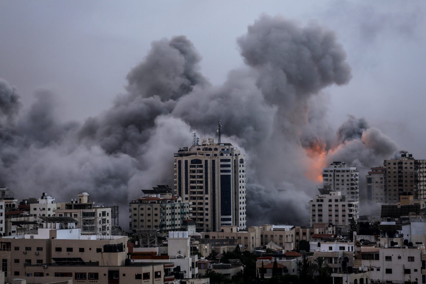 Photo: A smoke rises over a buildings in Gaza City on October 9, 2023 during an Israeli air strike. Credit: Photo by Sameh Rahmi/NurPhoto
