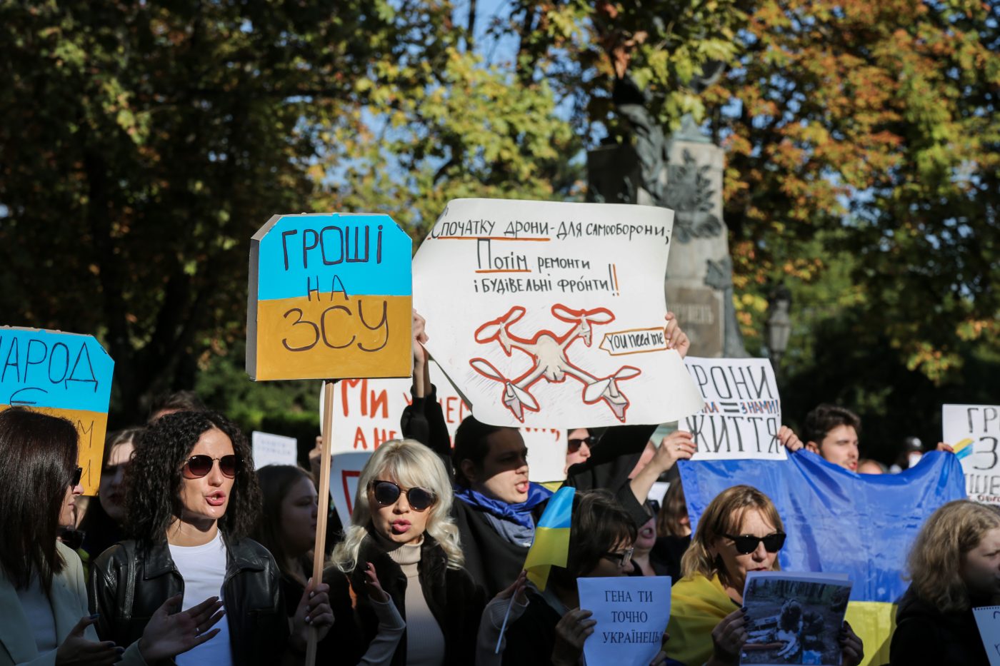 Photo: Protesters hold signs expressing their opinions near the City Hall building during the demonstration. For more than a month in Odessa, rallies against the misuse of budget funds have been held near the City Hall building. According to those protesting, all budget funds should be allocated to the needs of the Armed Forces of Ukraine, and not to secondary needs such as repairing buildings or purchasing Christmas trees. Credit: Photo by Viacheslav Onyshchenko / SOPA Images/Sipa USA. No Use Germany.