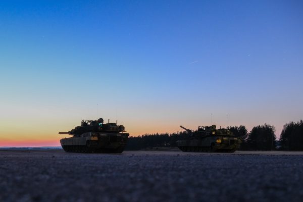 Photo:U.S. Soldiers with the 1st Armored Brigade Combat Team, 3rd Infantry Division conduct a night live-fire exercise with M1A2 Abrams Main Battle Tanks at the 7th Army Training Command's Grafenwoehr Training Area, Germany, March 3, 2022. The 1st ABCT, 3rd ID deployed to Europe to assure NATO allies, deter aggression against NATO member states and train with host-nation forces. Credit: U.S. Army photo by Cpl. Austin Riel via dvids