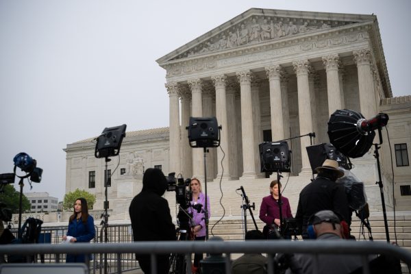 Photo: A general view of the U.S. Supreme Court building with media gathered in front, in Washington, D.C., on Tuesday, May 3, 2022. Last night a draft Supreme Court decision overturning the Roe v. Wade ruling that protects abortion rights was published by Politico, written by conservative Justice Samuel Alito it was a seismic shock to the American political world. Credit: Graeme Sloan/Sipa USA