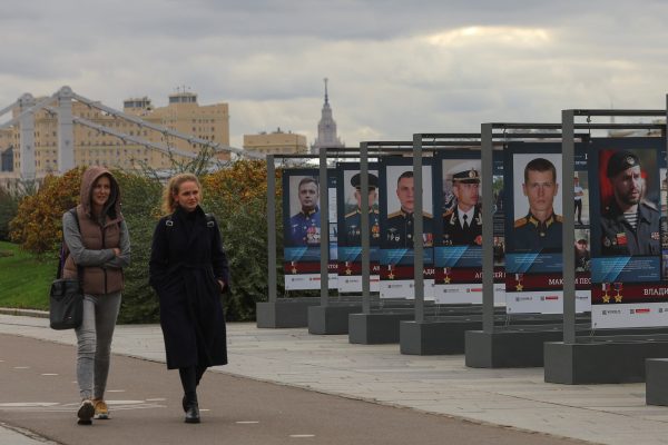 Photo: Women walk past banners honouring Russian service members involved in Russia-Ukraine conflict, on embankment in Moscow, Russia October 20, 2022. Credit: REUTERS/EVGENIA NOVOZHENINA