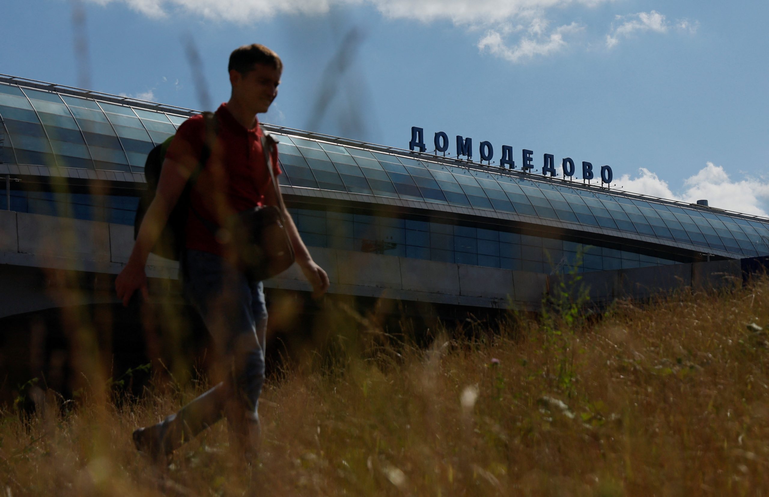 Photo: A man walks at the Domodedovo airport outside Moscow, Russia August 21, 2023. Credit: REUTERS/Maxim Shemetov.