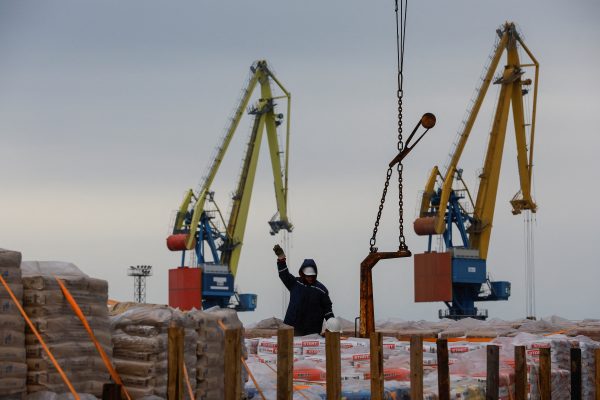 Photo: Workers unload construction supplies from a cargo vessel in the course of Russia-Ukraine conflict in the port of Mariupol, Russian-controlled Ukraine, October 25, 2023. Credit: REUTERS/Alexander Ermochenko