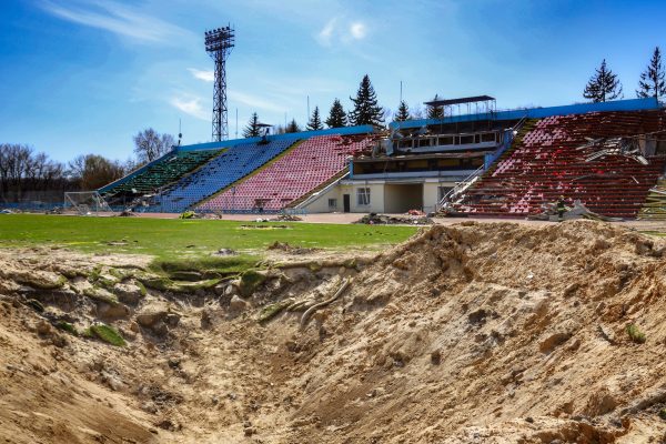Photo: CHERNIHIV, UKRAINE - APRIL 15, 2022 - A huge crater caused by Russian shelling remains on the pitch of the Chernihiv Olympic Sports Training Centre (formerly Yuri Gagarin Stadium), Chernihiv, northern Ukraine. NO USE FRANCE Credit: Nurphoto