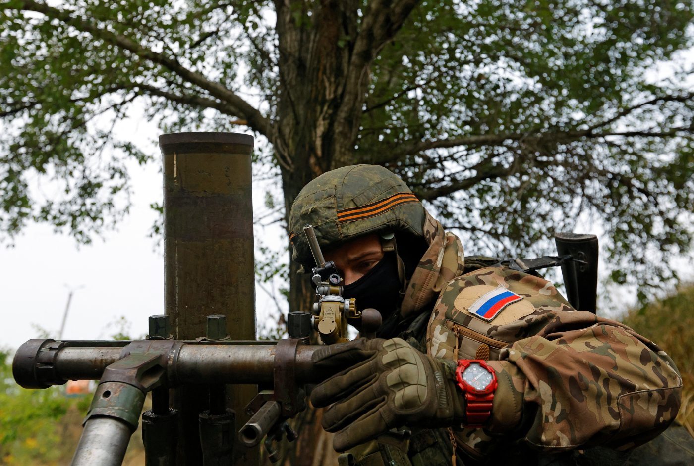 Photo: A service member of pro-Russian troops fires a mortar in the direction of Avdiivka during Russia-Ukraine conflict, outside Donetsk, Ukraine September 17, 2022. Credit: REUTERS/Alexander Ermochenko