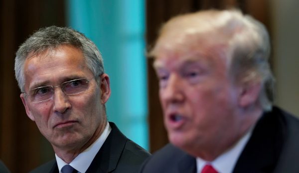 Photo: US President Donald Trump meets with NATO Secretary General Jens Stoltenberg (L) at the White House in Washington. U.S., May 17, 2018. Credit: REUTERS/Kevin Lamarque