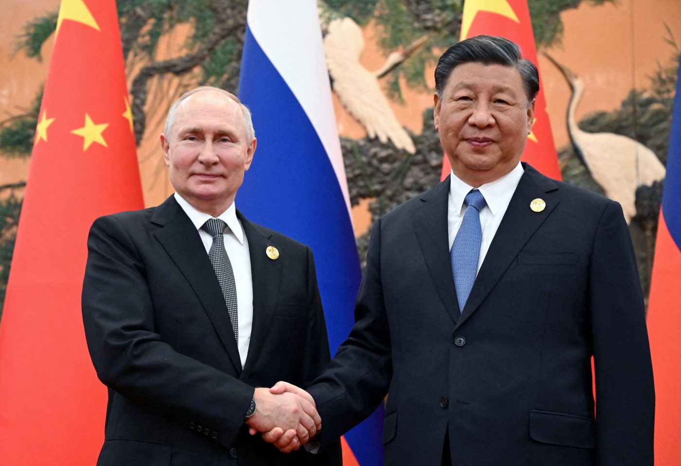 Photo: Russian President Vladimir Putin shakes hands with Chinese President Xi Jinping during a meeting at the Belt and Road Forum in Beijing, China, October 18, 2023. Credit: Sputnik/Sergei Guneev/Pool via REUTERS
