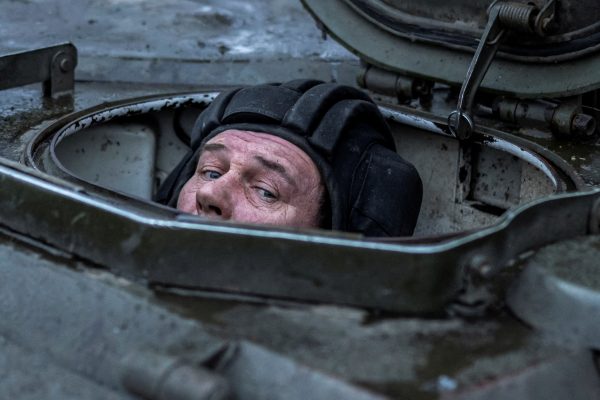 Photo: A Ukrainian service member of the 4th Ivan Vyhovskyi Separate Tank Brigade looks out from a 2S1 Gvozdika self-propelled howitzer before fire toward Russian troops near the front line town of Kupiansk, amid Russia's attack on Ukraine, on a Christmas Eve in Kharkiv region, Ukraine December 24, 2023. Credit: REUTERS/Viacheslav Ratynskyi TPX IMAGES OF THE DAY