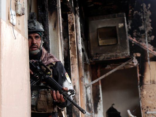 Photo: An Iraqi special forces soldier searches a house during a battle with Islamic State militants in Mosul, Iraq March 1, 2017. Credit: REUTERS/Goran Tomasevic