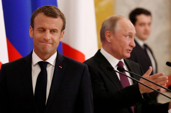 Photo: Russian President Vladimir Putin (R) and his French counterpart Emmanuel Macron attend a news briefing after the talks in St. Petersburg, Russia May 24, 2018. Credit: REUTERS/Grigory Dukor.