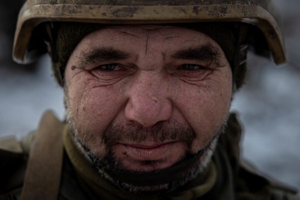 Photo: A Ukrainian serviceman of the 93rd separate mechanized brigade attends a Christmas Day service near the front line in the Donetsk region as Ukrainians celebrate their first Christmas according to a new calendar, amid Russia’s attack on Ukraine, December 25, 2023. Credit: REUTERS/Thomas Peter
