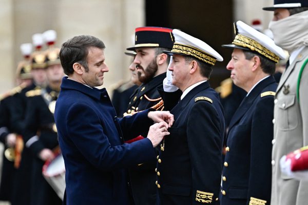 Photo: President Emmanuel Macron awards Controller General of the Armies Olivier Schmit with the Legion of Honour during a 'Prise d’armes’ military ceremony in the courtyard of the Hotel National des Invalides in Paris, France on February 19, 2024. Credit: Photo by Eric Tschaen/Pool/ABACAPRESS.COM
