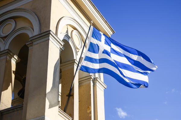 Photo: Greek flag is seen on Church of Panagia Pantanassa in Monastiraki in Athens, Greece on March 13, 2024. Credit: Photo by Beata Zawrzel/NurPhoto
