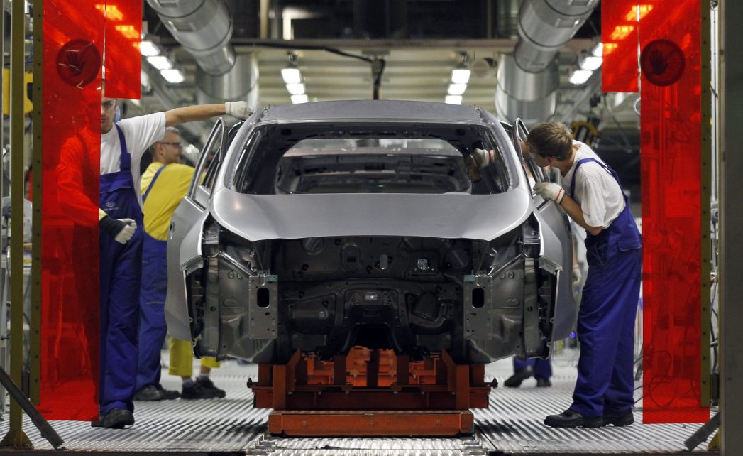 Photo: Workers assemble Kia cars in its factory in Zilina, 200 kilometres north of Bratislava October 3, 2012. Carmakers that cut costs last decade in Western Europe like Volkswagen, or those who were never saddled with expensive factories there, such as Korea's Hyundai and Kia, are now investing in new designs, conquering new markets and ramping up production. Between them, VW Group, Mercedes, Kia and Hyundai have raised their share of the European market to 35.5 percent in the eight months to end August 2012, from 30 percent in the same period of 2010. Up the road in the foothills of Slovakia's Fatra mountains, the most modern factory owned by Korean carmaker Kia Motors looks set to beat its production goal of 285,000 SUVs, compact and family cars. Picture taken October 3, 2012. Credit: To match Insight AUTOS-CENTRALEUROPE/ REUTERS/Petr Josek