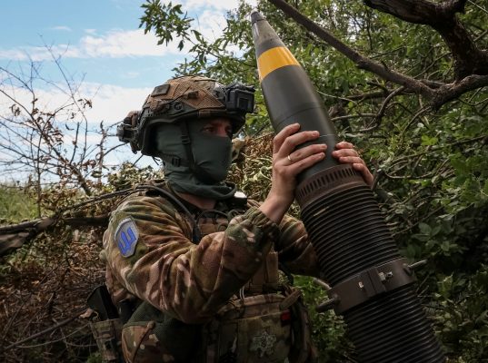 Photo: A Ukrainian serviceman, of the 10th separate mountain assault brigade of the Armed Forces of Ukraine, prepares to fire a mortar at his position at a front line, amid Russia's attack on Ukraine, near the city of Bakhmut in Donetsk region, Ukraine July 13, 2023. Credit: REUTERS/Sofiia Gatilova