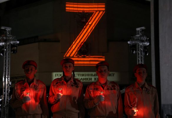 Photo: Members of the Youth Army military-patriotic movement attend a ceremony of projecting portraits of Russian service members killed in Russia-Ukraine conflict and the symbol "Z" onto the State Council building in Simferopol, Crimea April 8, 2024. Credit: REUTERS/Alexey Pavlishak