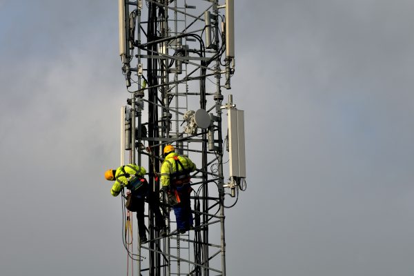 Photo: Telecommunications technicians repair a phone network antenna in Dublin, Ireland. (Jan 16, 2009). Credit: Douglas O’Connor.
