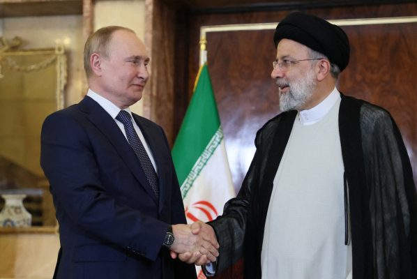 Photo: Russian President Vladimir Putin shakes hands with Iranian President Ebrahim Raisi during a meeting in Tehran, Iran July 19, 2022. Credit: Sputnik/Sergei Savostyanov/Pool via REUTERS