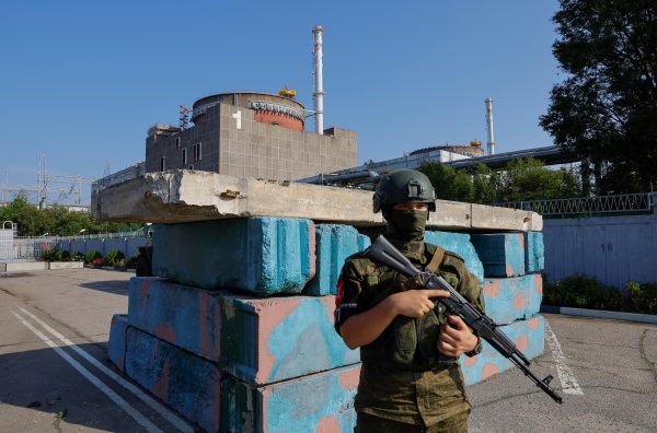 Photo: A Russian service member stands guard at a checkpoint near the Zaporizhzhia Nuclear Power Plant before the arrival of the International Atomic Energy Agency (IAEA) expert mission in the course of Russia-Ukraine conflict outside Enerhodar in the Zaporizhzhia region, Russian-controlled Ukraine, June 15, 2023. Credit: REUTERS/Alexander Ermochenko