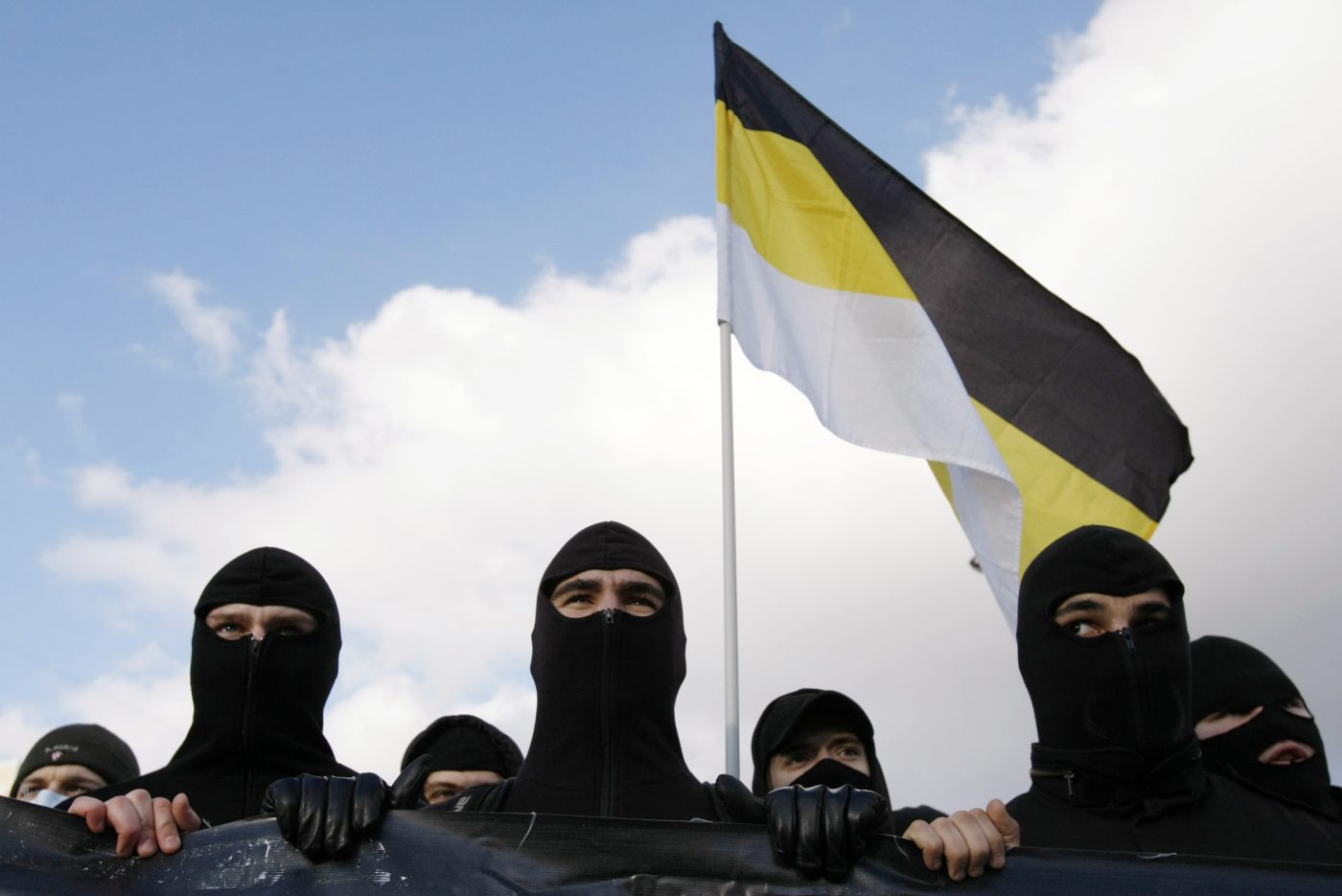 Photo: Russian ultra nationalists carry the historic flag of the Russian empire during a demonstration on the outskirts of Moscow November 4, 2009. Russia celebrates National Unity Day, a state holiday, on November 4. Credit: REUTERS/Denis Sinyakov