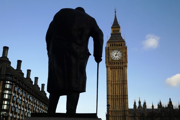 Photo: The statue of Britain's former Prime Minister Winston Churchill is silhouetted in front of the Houses of Parliament in London January 24, 2015. Today is the 50th anniversary of the World War Two statesman's death. Credit: REUTERS/Luke MacGregor
