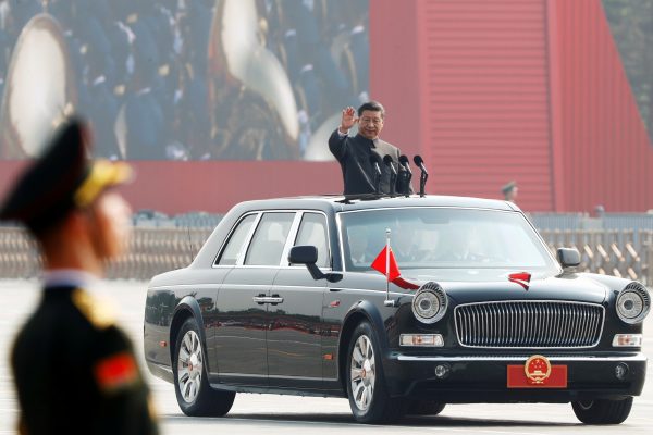 Photo: Chinese President Xi Jinping waves from a vehicle as he reviews the troops at a military parade marking the 70th founding anniversary of People's Republic of China, on its National Day in Beijing, China October 1, 2019. Credit: REUTERS/Thomas Peter