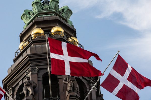 Photo: Danish flags flutter on Christiansborg Castle Square in connection with the opening of the Danish Parliament on Tuesday 1 October 2024. Folketinget opens today. The opening marks the beginning of a new parliamentary year. The day begins with a church service in Christiansborg Palace Chapel. The first meeting of Folketinget starts at midday. Copenhagen Christiansborg Denmark Credit: IMAGO/Kristian Tuxen Ladegaard Berg.