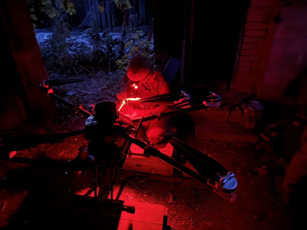 Photo: Soldiers from Yasni Ochi setting up the drone for bombing operations. Credit: Photo Courtesy of David Kirichenko.