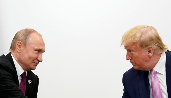 Photo: US President Donald Trump and Russian President Vladimir Putin hold a bilateral meeting at the G20 leaders summit in Osaka, Japan June 28, 2019. Credit: REUTERS/Kevin Lamarque