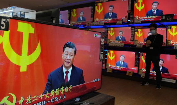 Photo: TV screen displaying news reporting of Chinese President Xi Jinping with his new team meet the media in Beijing at Quarry Bay department store. 23OCT22. Credit: SCMP / Robert Ng
