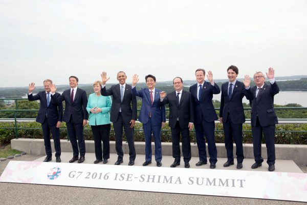 Photo: President Barack Obama joins G7 Summit leaders for a "family" group photo at the Shima Kanko Hotel, Bay Suites, in Shima City, Japan, May 26, 2016. G7 leaders include: Prime Minister Justin Trudeau of Canada, President François Hollande of France, Chancellor Angela Merkel of Germany, President Matteo Renzi of Italy, Prime Minister Shinzo Abe of Japan, Prime Minister David Cameron of the United Kingdom, European Council President Donald Tusk, European Commission President Jean-Claude Juncker. Credit: Official White House Photo by Lawrence Jackson via Wikimedia Commons