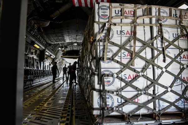 Photo: Humanitarian aid from the U.S. Agency for International Development, is loaded onto a C-17 Globemaster assigned to the 379th Air Expeditionary Wing, September 9, 2022 at Al Dhafra Air Base, United Arab Emirates. Relief items included plastic sheeting, kitchen sets, tarps and shelter building kits. Credit: IMAGO/piemags via Reuters Connect