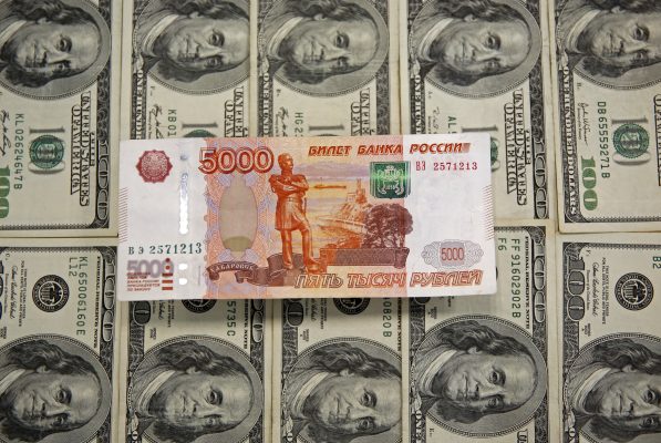 Photo: A picture illustration shows US Dollar and Russian Ruble banknotes in Sarajevo, March 9, 2015. Credit: REUTERS/Dado Ruvic