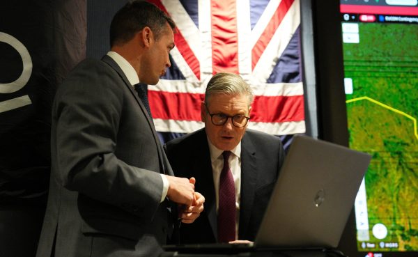 Photo: UK Prime Minister Keir Starmer tours Palantir Technologies headquarters with a company employee in Washington, DC, U.S., February 27, 2025. Credit: Carl Court/Pool via REUTERS