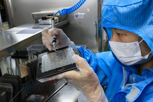 Photo: An employee works on the production line of Zhejiang Huilong Chip Technology Co., Ltd. on October 25, 2024 in Jinhua, Zhejiang Province of China. Credit:Pan Qiuya/VCG
