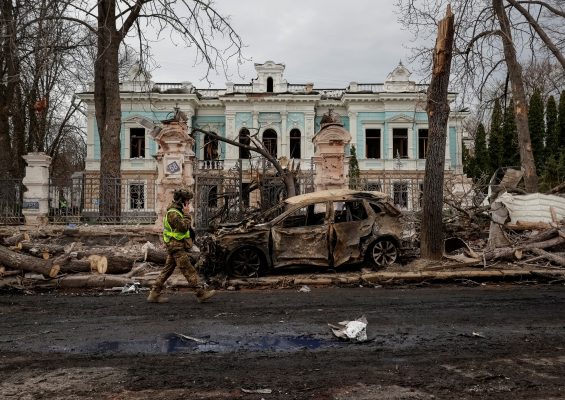 Photo: A Ukrainian serviceman walks at the site of a Russian missile strike, amid Russia's attack on Ukraine, in Sumy, Ukraine April 13, 2025. Credit: REUTERS/Sofiia Gatilova