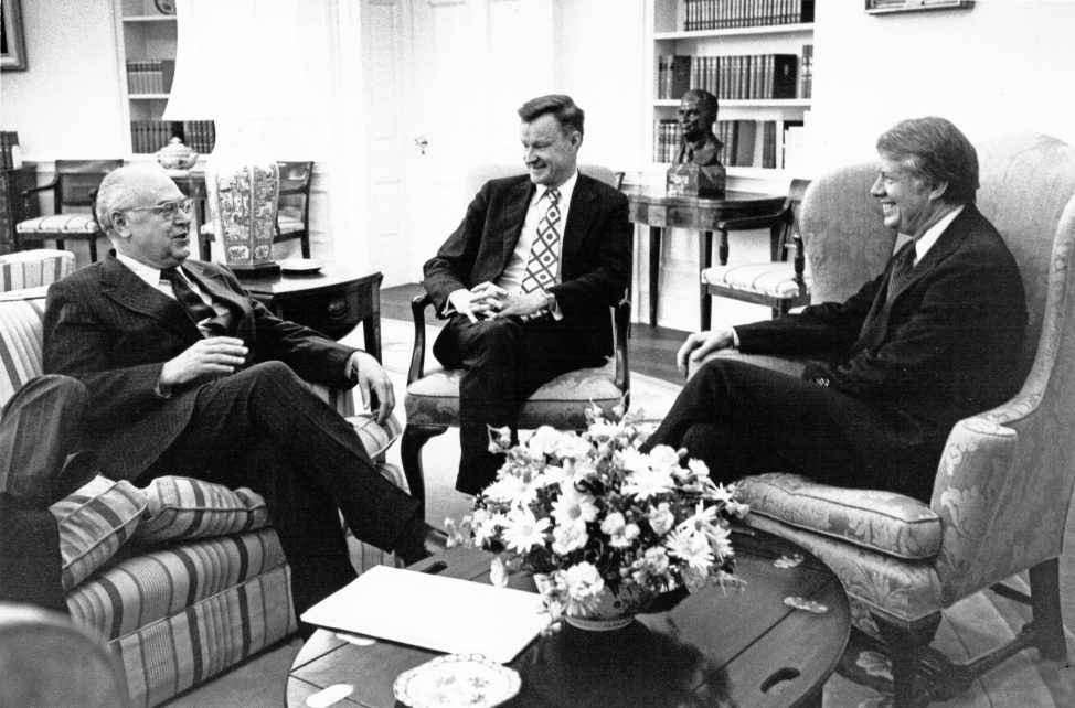 Photo: United States President Jimmy Carter, right, meets Ambassador of the USSR Anatoliy F. Dobrynin, left, and National Security Advisor Zbigniew Brzezinski, center, in the Oval Office of the White House in Washington, DC on April 12, 1977. They met to discuss the SALT talks and other matters. Credit: White House via CNP/Sipa USA