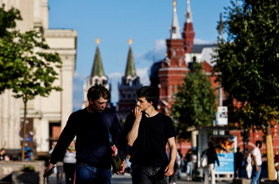 Photo: People walk during sunset in Moscow, Russia July 20, 2023. Credit: REUTERS/Maxim Shemetov