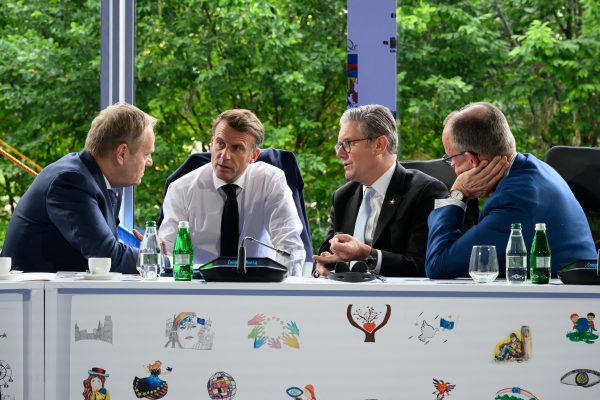 Photo: Poland's Prime Minister Donald Tusk, France's President Emmanuel Macron, Britain's Prime Minister Keir Starmer and Germany's Chancellor Friedrich Merz speak during Ukraine security meeting at the 6th European Political Community summit on May 16, 2025 at Skanderbeg Square in Tirana, Albania. Credit: Leon Neal/Pool via REUTERS