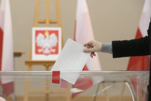 Photo: A woman casts her ballot at a polling station during presidential elections in Warsaw, Poland, on May 18, 2025. Credit: Aleksander Kalka/NurPhoto
