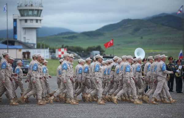 Photo: Russian service members attend a base closing ceremony in the course of peacekeeping troops' withdrawal from the territory of Karabakh region and areas nearby, in Khojaly, Azerbaijan May 15, 2024. Credit: REUTERS/Aziz Karimov