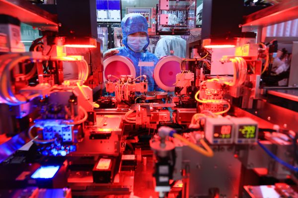 Photo: An employee works on the production line of Zhejiang Huilong Chip Technology Co., Ltd. on October 25, 2024 in Jinhua, Zhejiang Province of China. Credit: Photo by Pan Qiuya/VCG