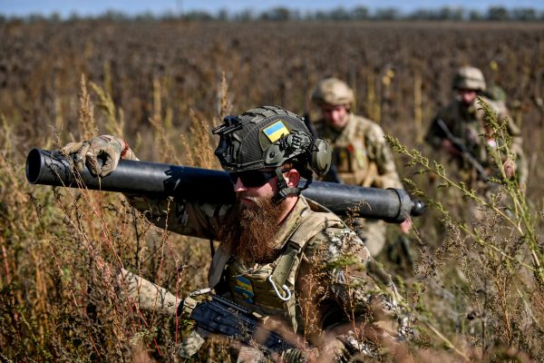 Photo: ZAPORIZHZHIA REGION, UKRAINE - OCTOBER 05, 2022 - Military mortar crew march through the field of dry sunflowers, Zaporizhzhia Region, southeastern Ukraine. Credit: Dmytro Smoliyenko via Reuters Connect